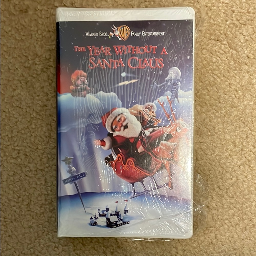 Warner Bros. Festive Santa Claus VHS - Red and Blue Cover